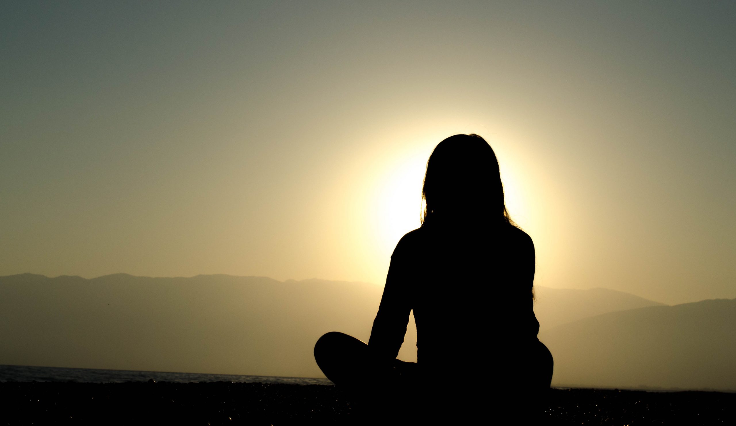 woman meditating in the morning