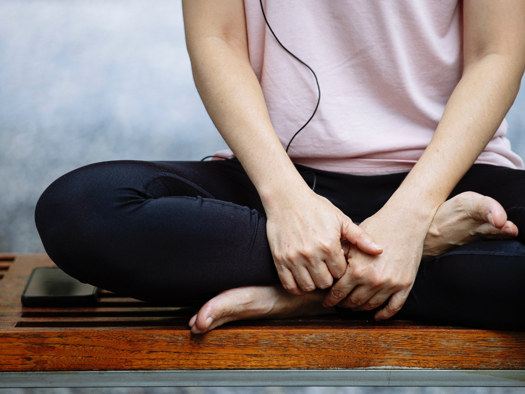 A person experiencing meditation via App