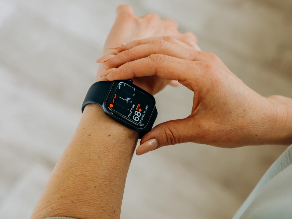 An image of a person checking the watch timer