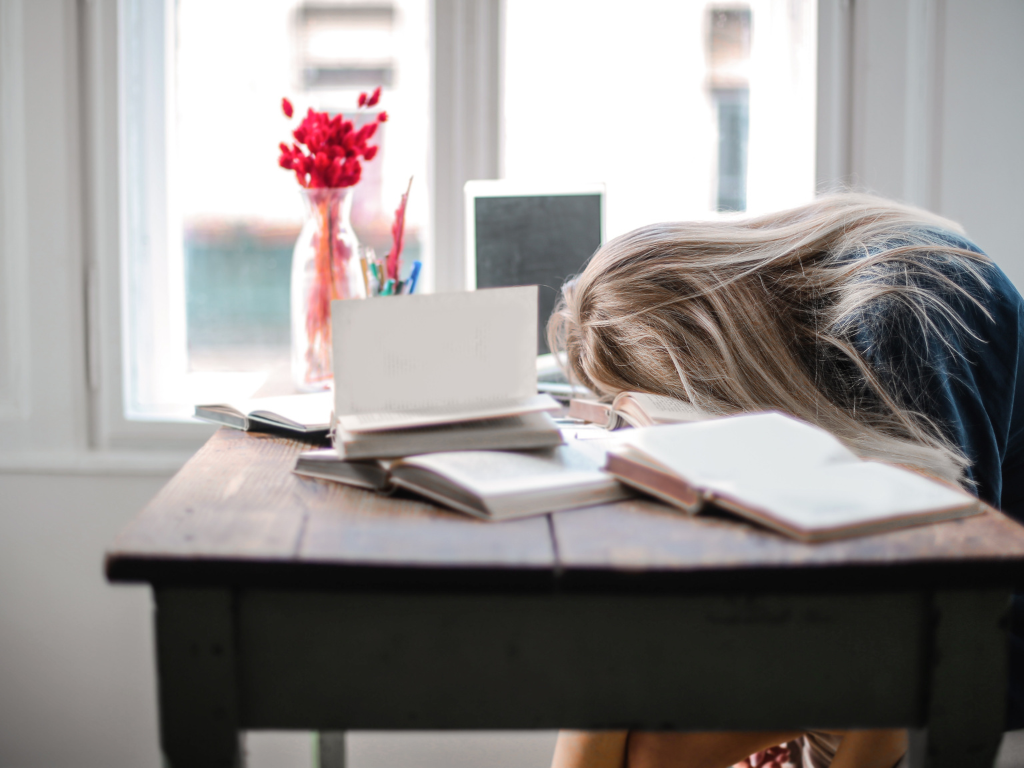 An image of a woman sleeping during the day time.